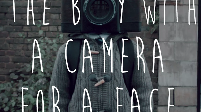 The Boy with a Camera for a Face