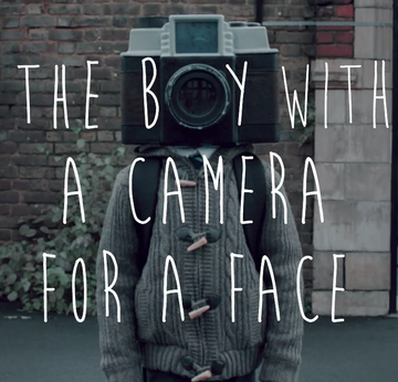 The Boy with a Camera for a Face