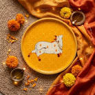 Nandini in Saffron | Hand-Painted Pichwai Cow Wall Art Curate Premium Wall Art Canvas by MeriDeewar